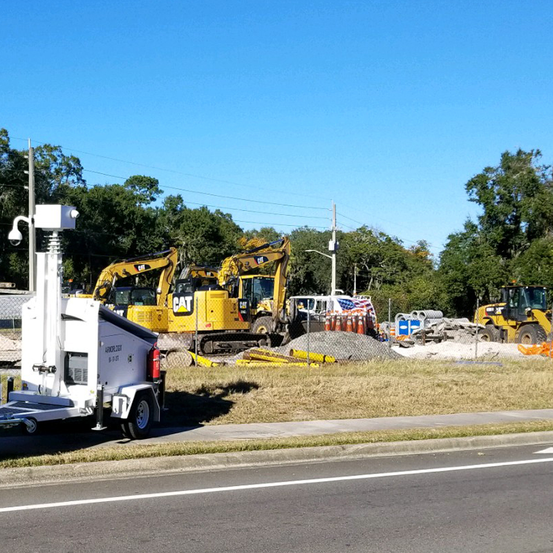Mobile surveillance trailers for construction site security systems.